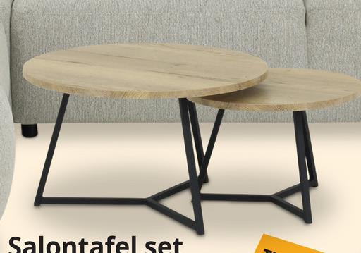 Salontafel Set van 2 ZYAN Natuur Ontdek de prachtige Salontafel ZYAN, een harmonieuze set van twee tafeltjes die jouw woonruimte een eigentijdse uitstraling geeft. Met een royaal grootste tafeltje van 75 cm diameter en een charmant kleinere variant van 55 cm diameter, biedt Zyan veelzijdigheid in stijlvolle proporties. De salontafels zijn vervaardigd uit duurzaam lamulux, wat niet alleen zorgt voor kras- en hittebestendigheid, maar ook een warme look geeft dankzij de mooie natuurlijke houtlook.Het meest opvallende kenmerk van de deze salontafel is de verfijnde pootconstructie, die het geheel tot een ware eyecatcher maakt. Creëer een warme en hedendaagse sfeer in je woonkamer met dit unieke design.