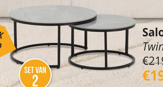 Salontafel Set van 2 TWINNY Wit Ontdek de perfecte aanvulling voor jouw woonruimte met onze salontafel set TWINNY! Deze set bestaat uit twee prachtige ronde salontafels, ontworpen om jouw interieur te verfraaien en functionaliteit toe te voegen.De kleinere tafel, met een diameter van 60 cm en een hoogte van 37 cm, past perfect bij de grotere tafel, die een diameter heeft van 80 cm en een hoogte van 41 cm. Samen creëren ze een dynamisch duo dat jouw woonkamer naar een hoger niveau tilt.Beide tafels zijn vervaardigd uit gesinterd wit, wat zorgt voor duurzaamheid en een moderne uitstraling. Het strakke en eigentijdse ontwerp wordt versterkt door de zwarte onderstellen, die niet alleen stabiliteit bieden, maar ook een vleugje elegantie toevoegen aan het geheel.